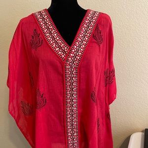 Red printed trim poncho.